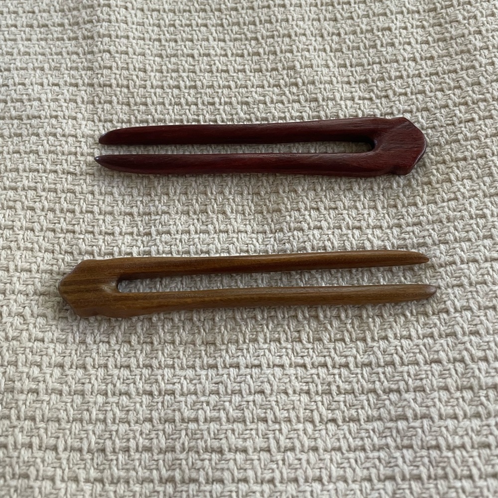 Two new wooden hair pins. 1 red sandalwood & 1 guaiac wood.